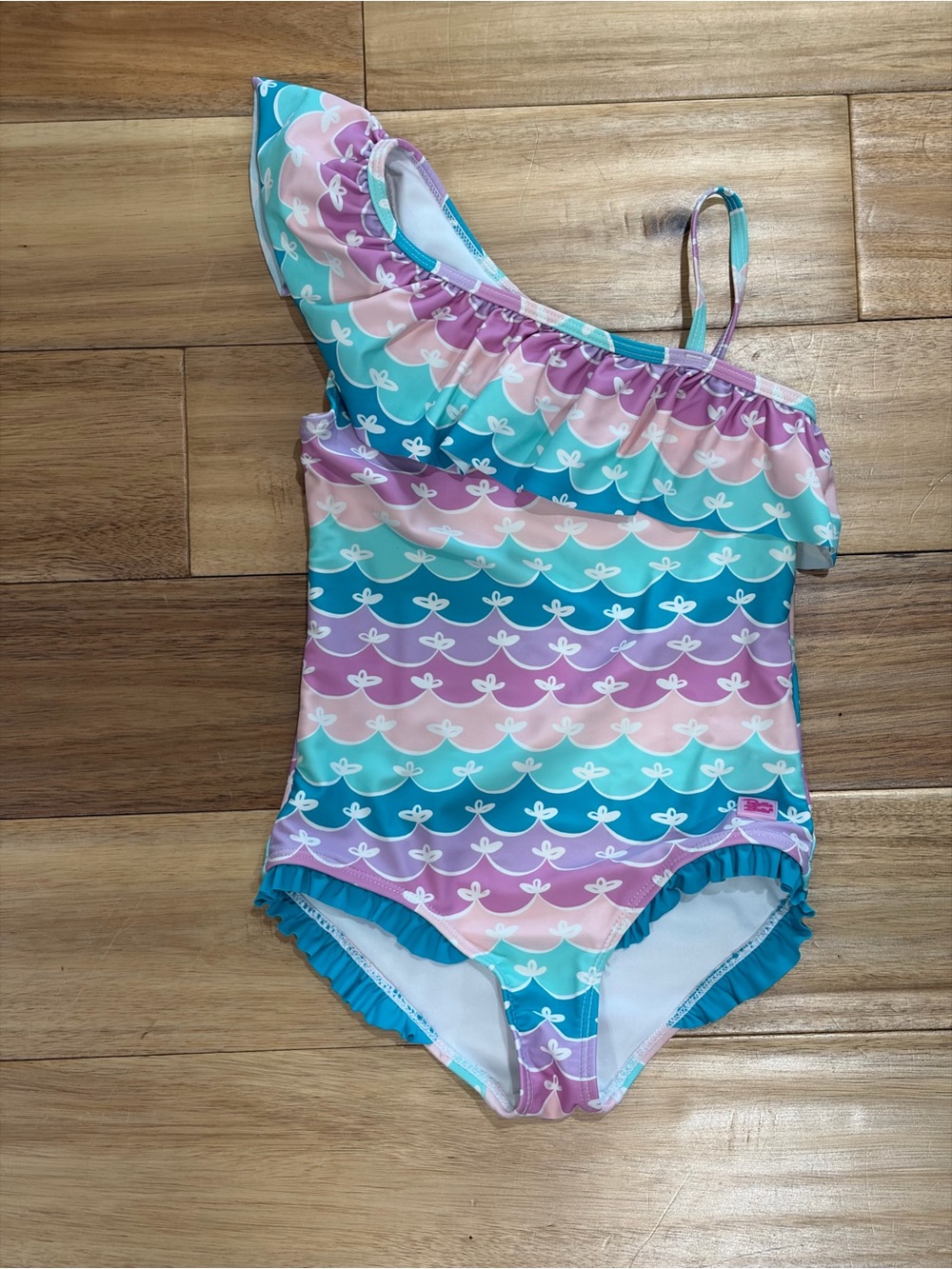 Ruffle Butts One-Shoulder Ruffle Swimsuit in Aqua, Teal, Pink, Purple